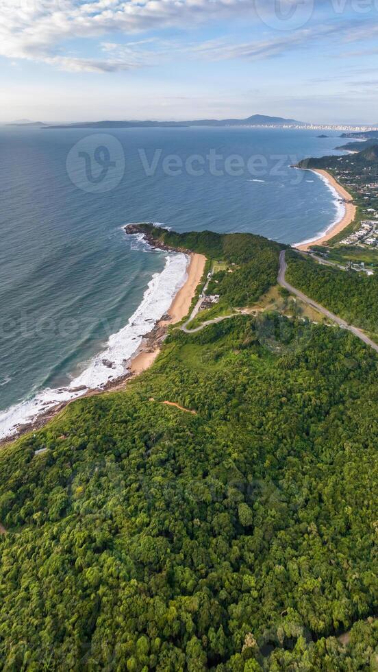 Balneario Camboriu in Santa Catarina. Taquaras Beach and Laranjeiras Beach in Balneario Camboriu. Aerial view in landscape. photo