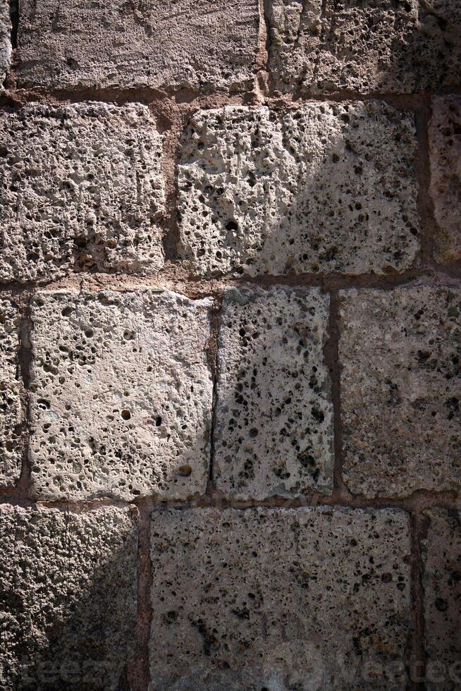 Texture and background of old stone wall memo architecture as background and texture. photo