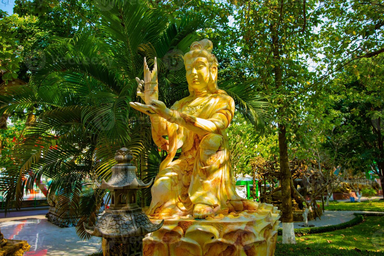 A Guardian statue at Suoi Tien park in Ho Chi Minh Vietnam photo