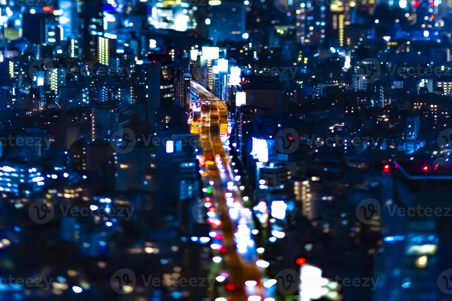 A night miniature highway at the urban city in Tokyo tiltshift photo