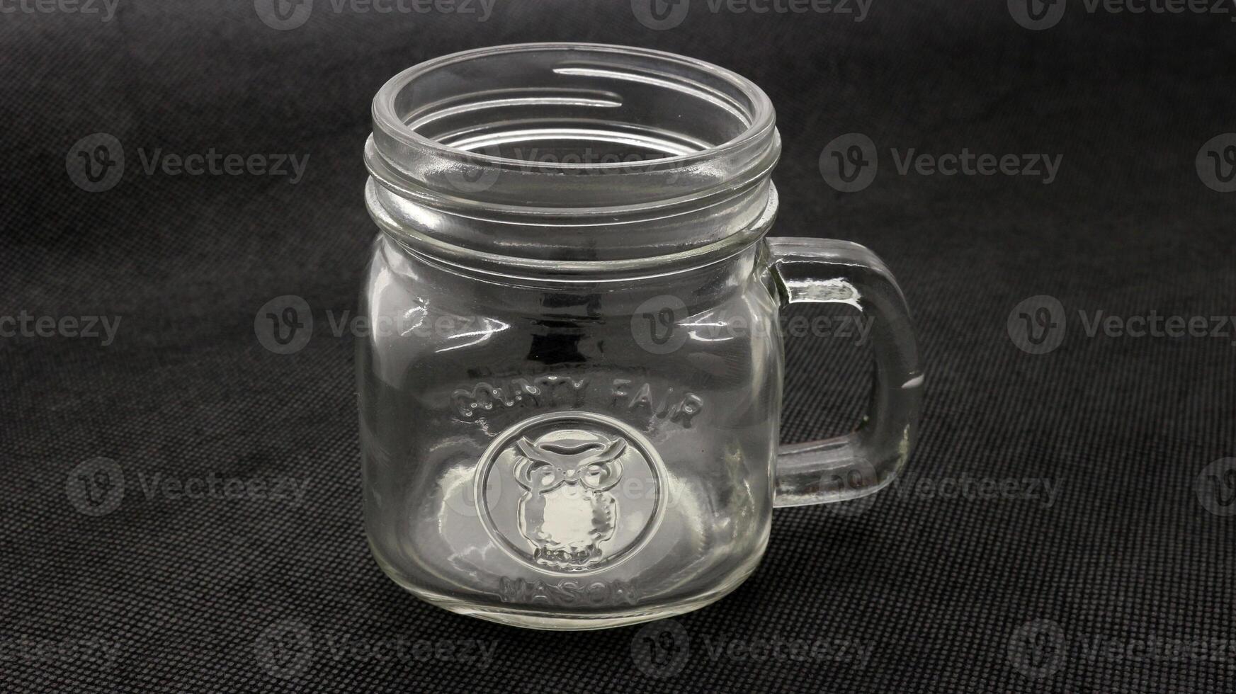 Close up of empty glass cup isolated photo