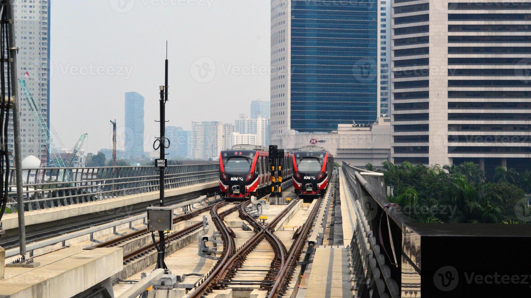 Commuter Line or electric train in Jakarta, Indonesia photo