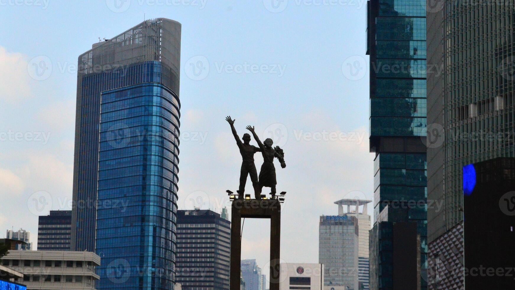 View of the city of Jakarta from a height monument selamat datang photo