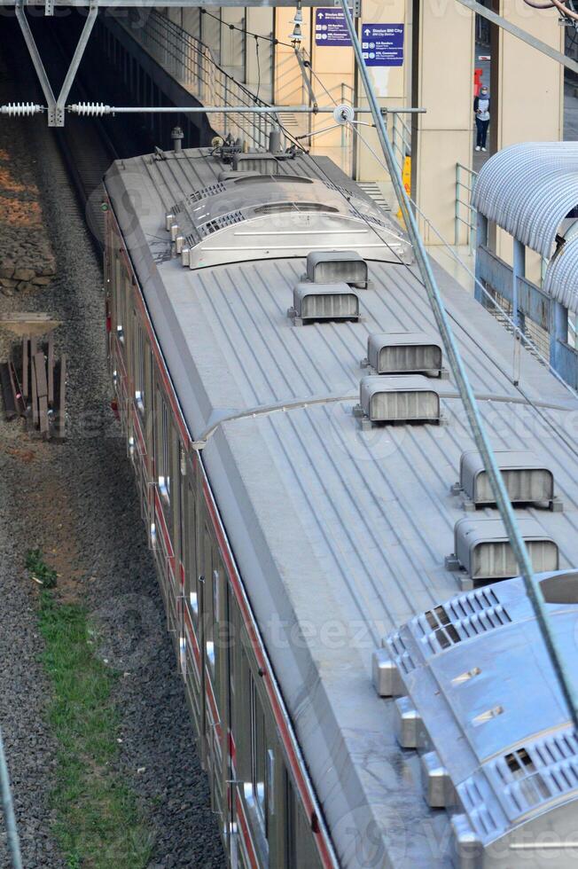 Commuter Line or electric train in Jakarta, Indonesia. photo