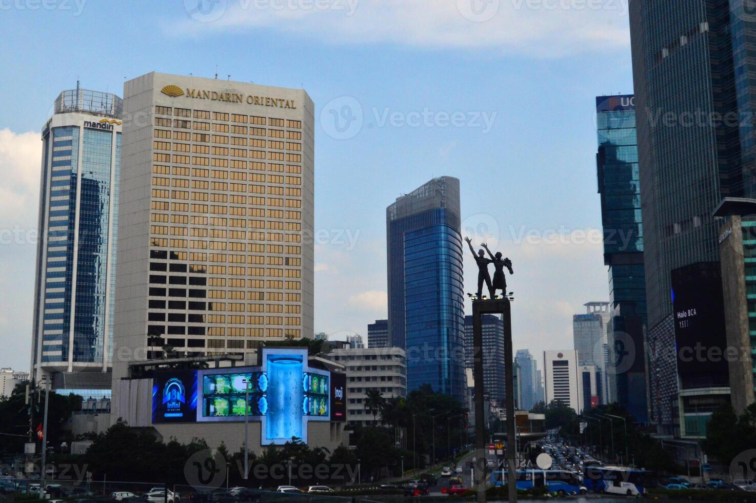 View of the city of Jakarta from a height monument selamat datang photo