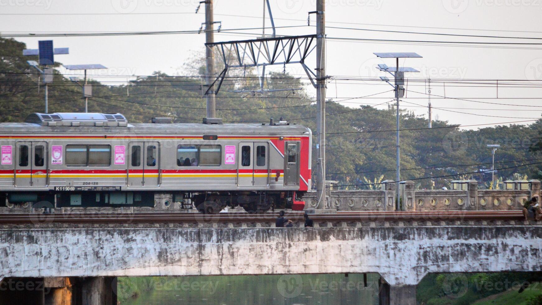 Commuter Line or electric train in Jakarta, Indonesia. photo