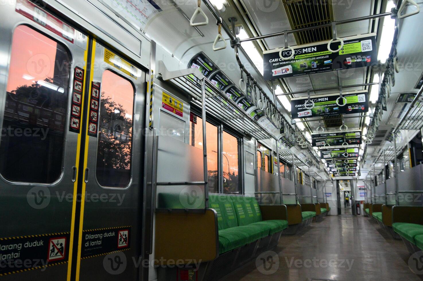 Interior Commuter Line or electric train in Jakarta, Indonesia photo