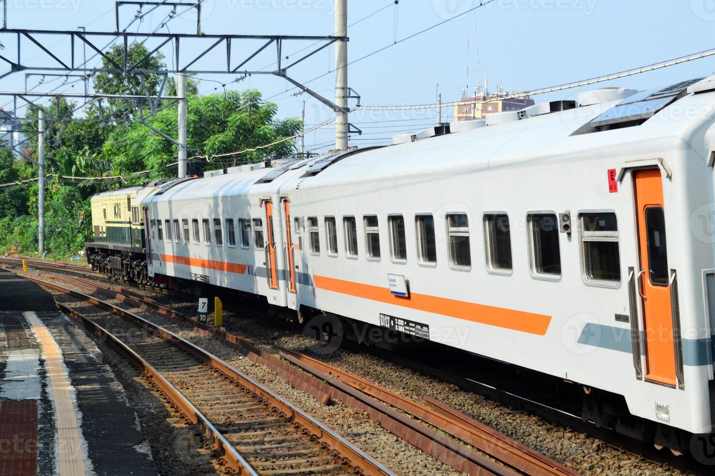 Commuter Line or electric train in Jakarta, Indonesia. photo