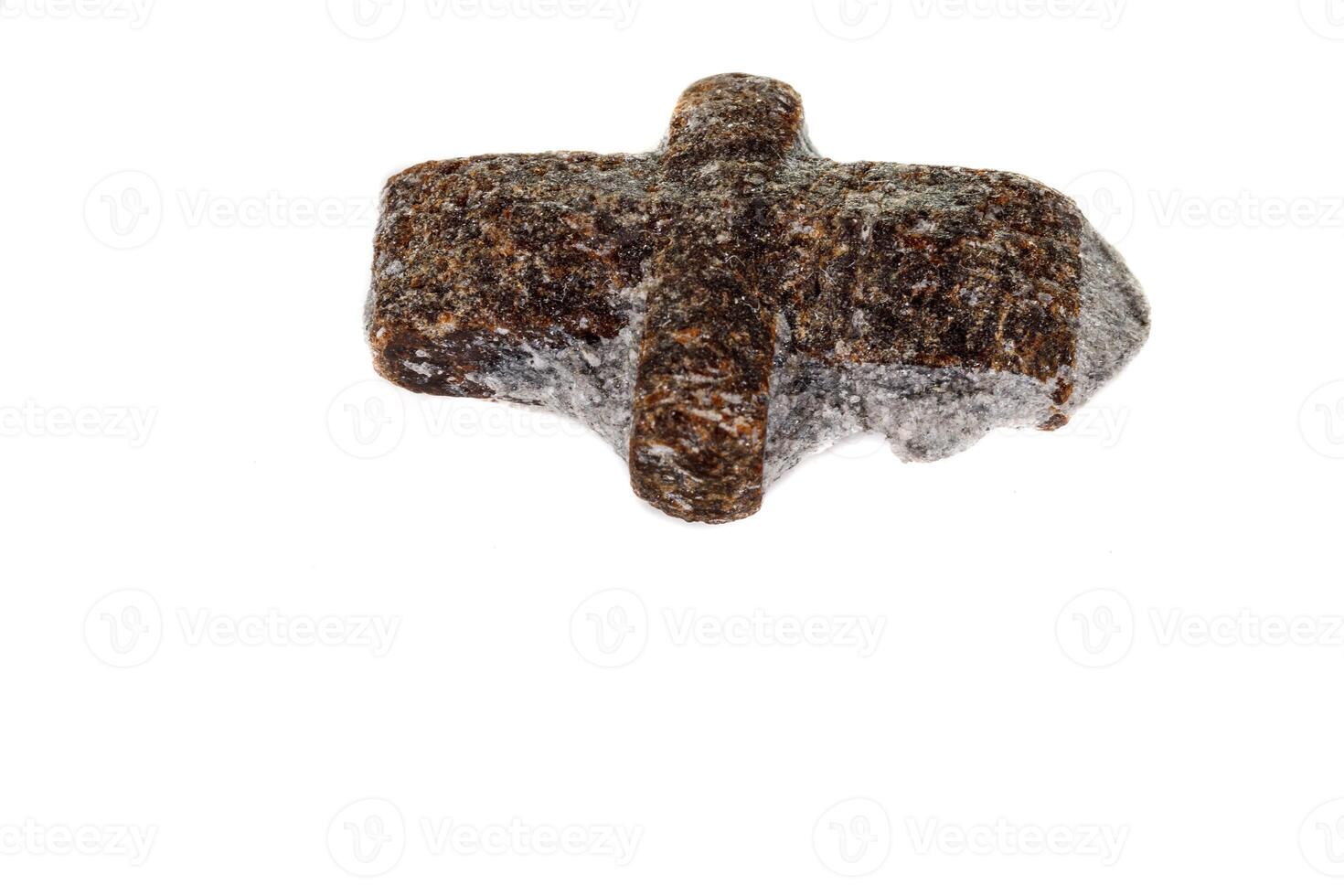 macro mineral stone Staurolite on a white background photo