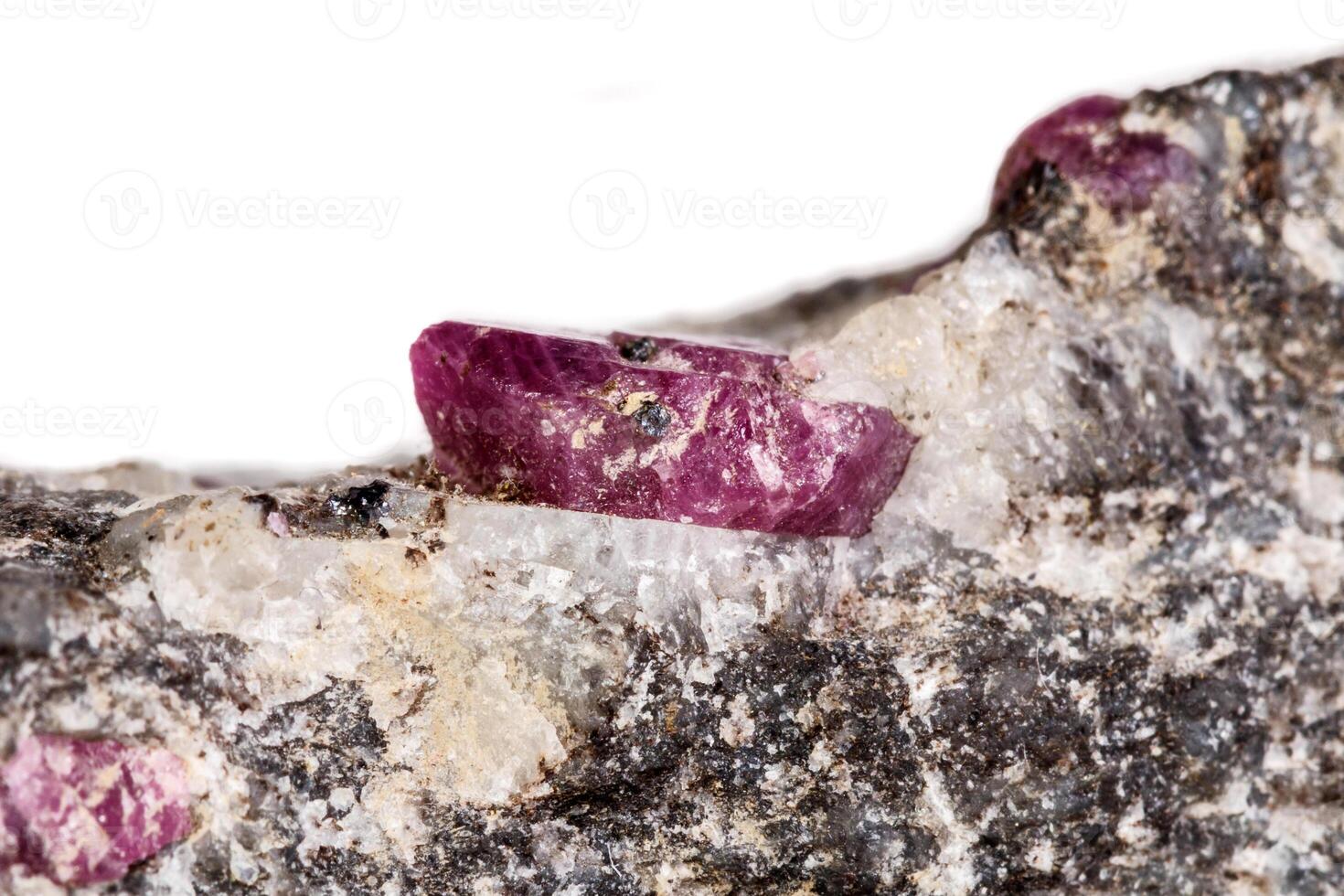 Macro of a mineral Ruby stone on a white background photo