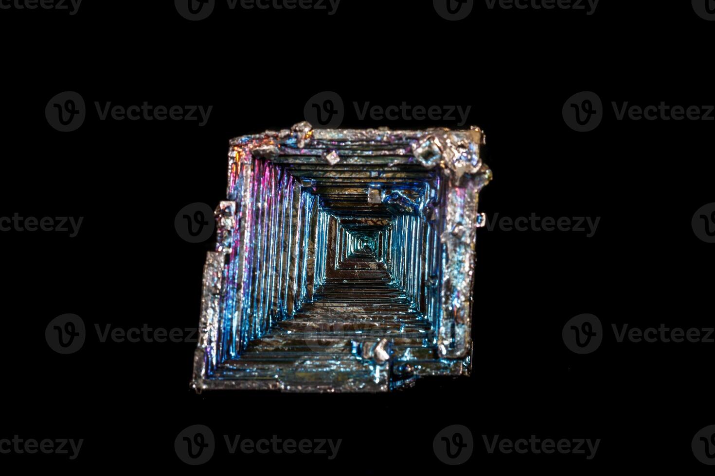 Macro of the stone bismuth mineral on a black background photo