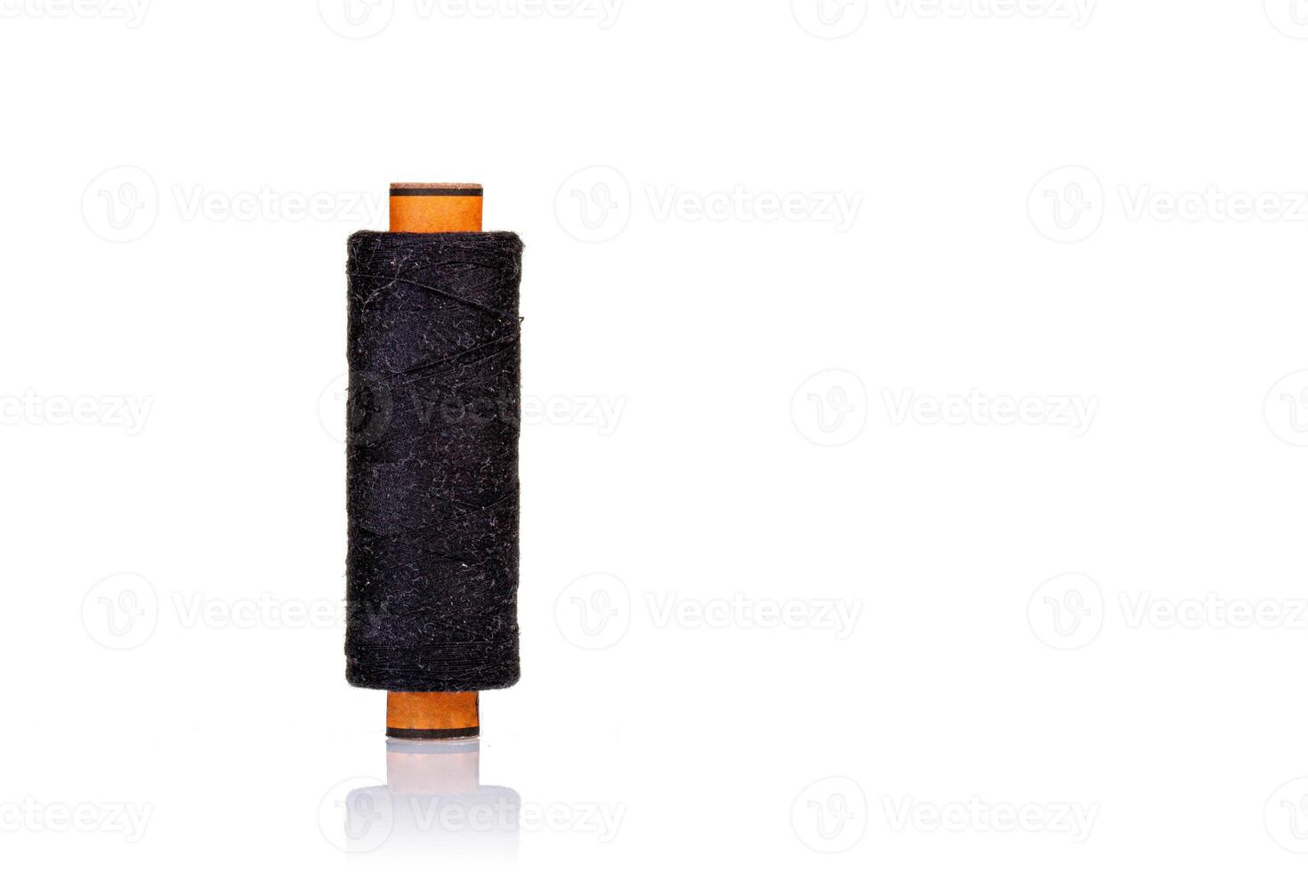 skein of thread black colors macro on a white background photo