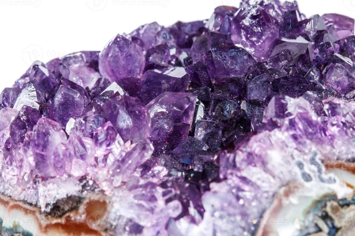 Amethyst Crystal Druse macro mineral on white background photo