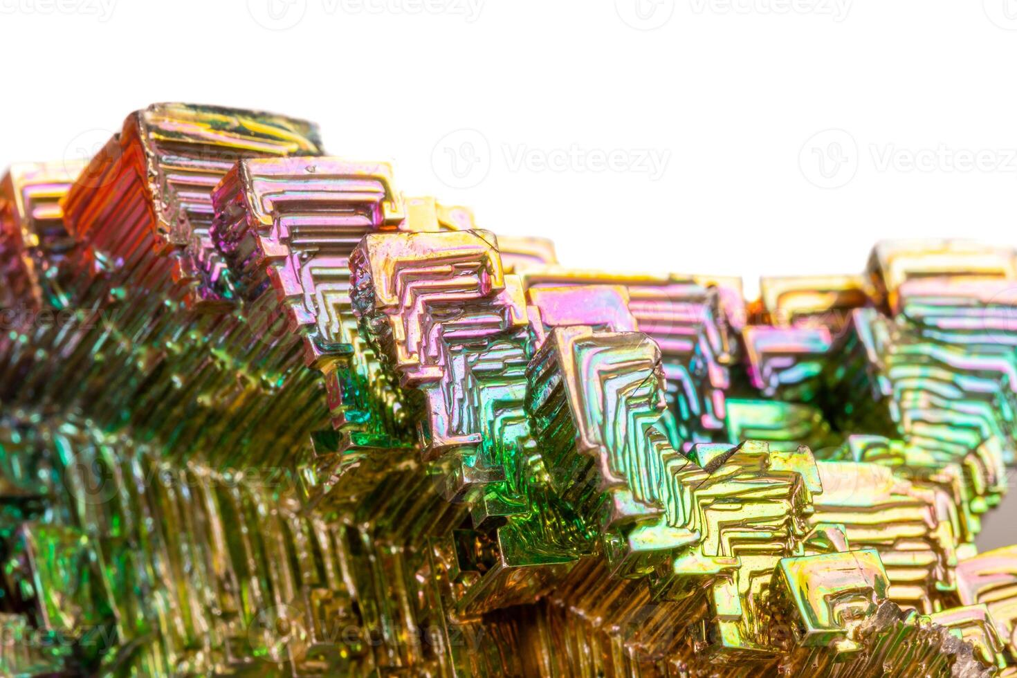 Macro of the mineral bismuth stone on a white background photo