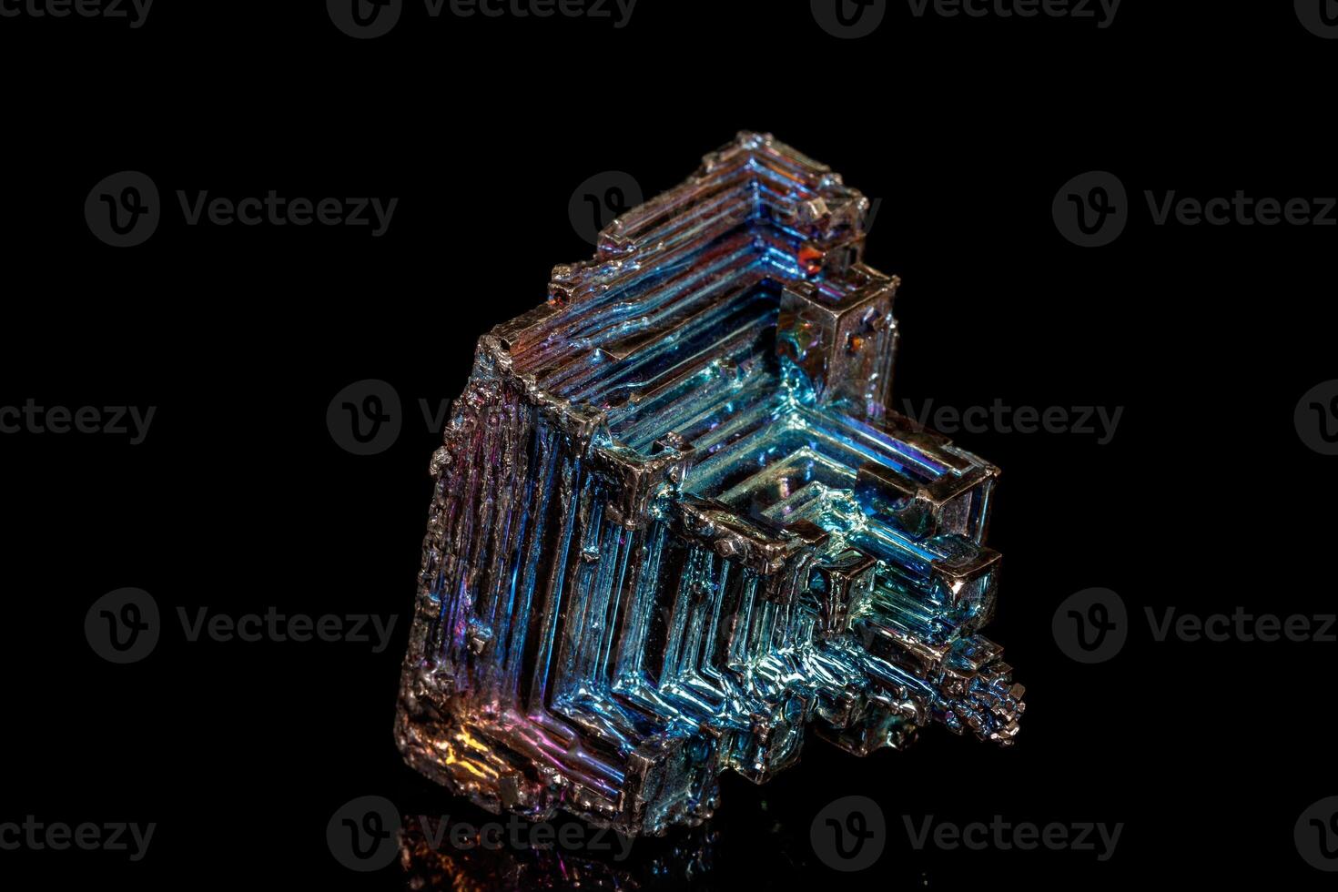 Macro of the stone bismuth mineral on a black background photo