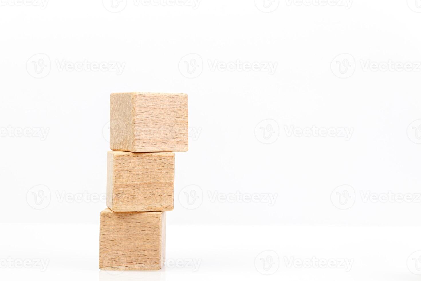 Wooden cubes on a white background photo