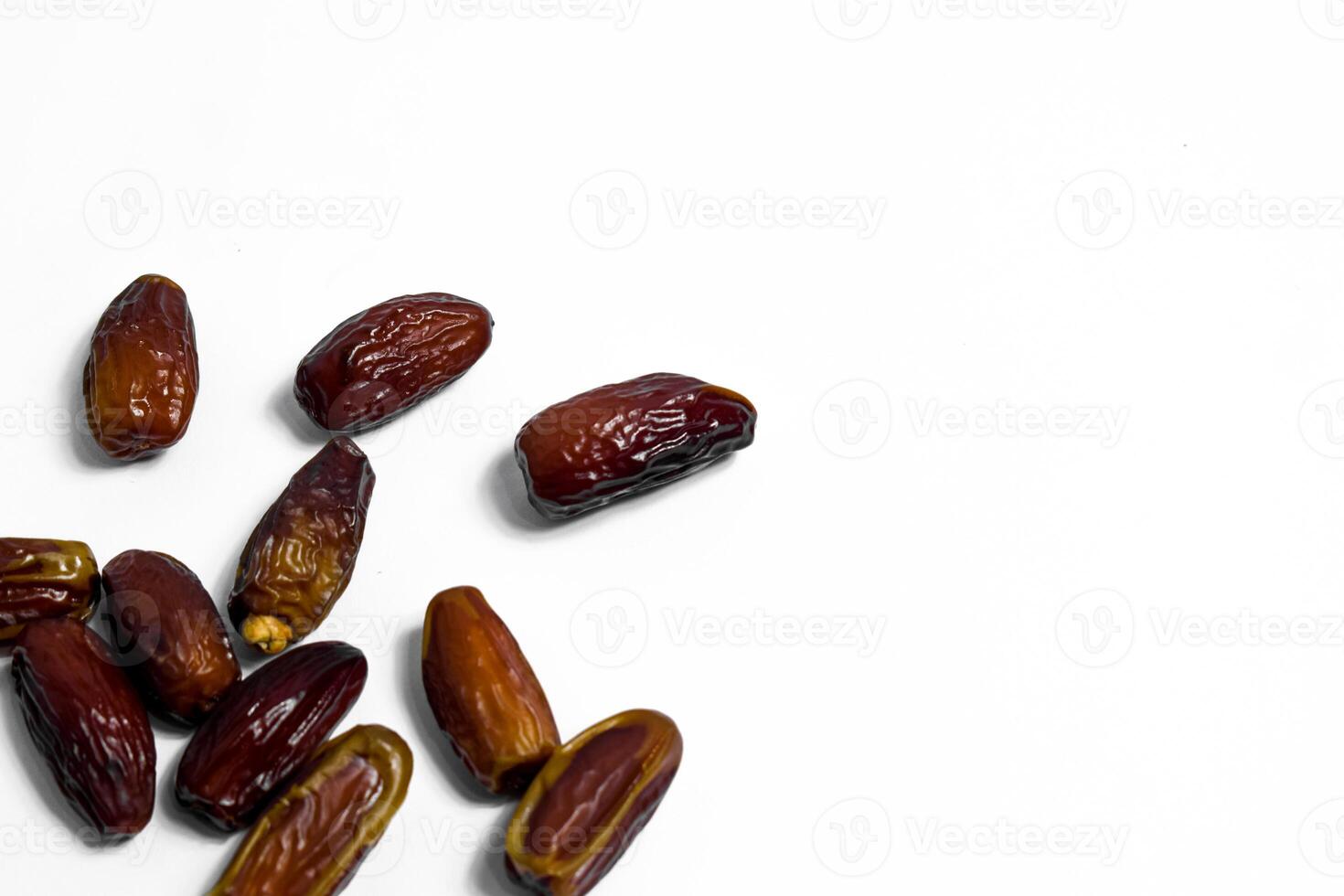 Dates fruit on isolated white background and copy space photo