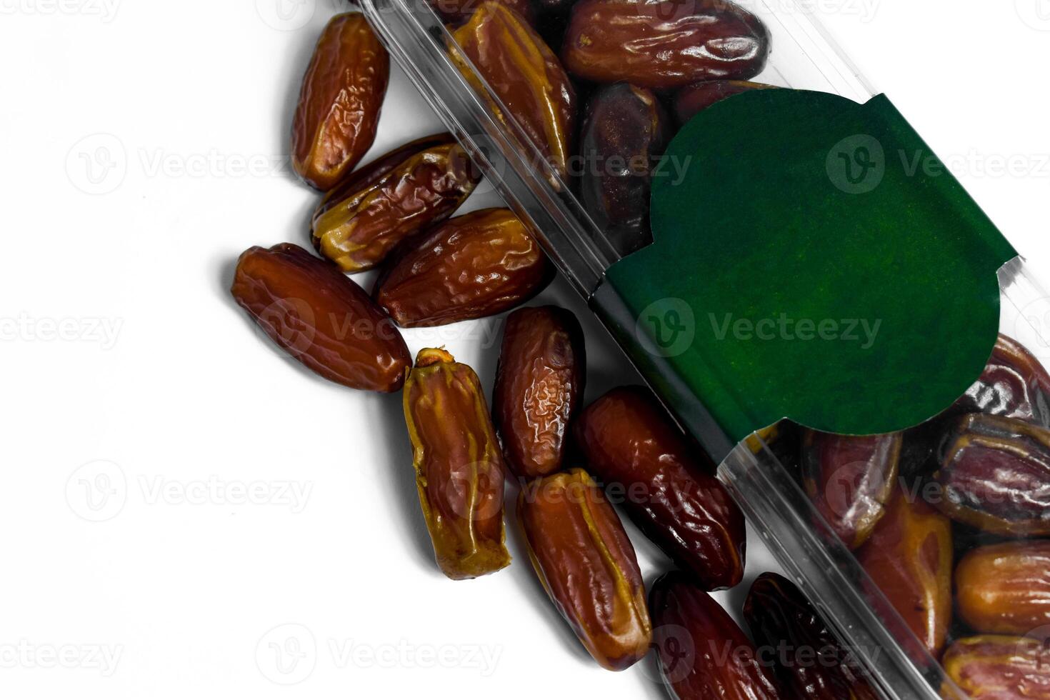Dates fruit in plastick package with blank green label for product mockup design, dates product isolated white background photo