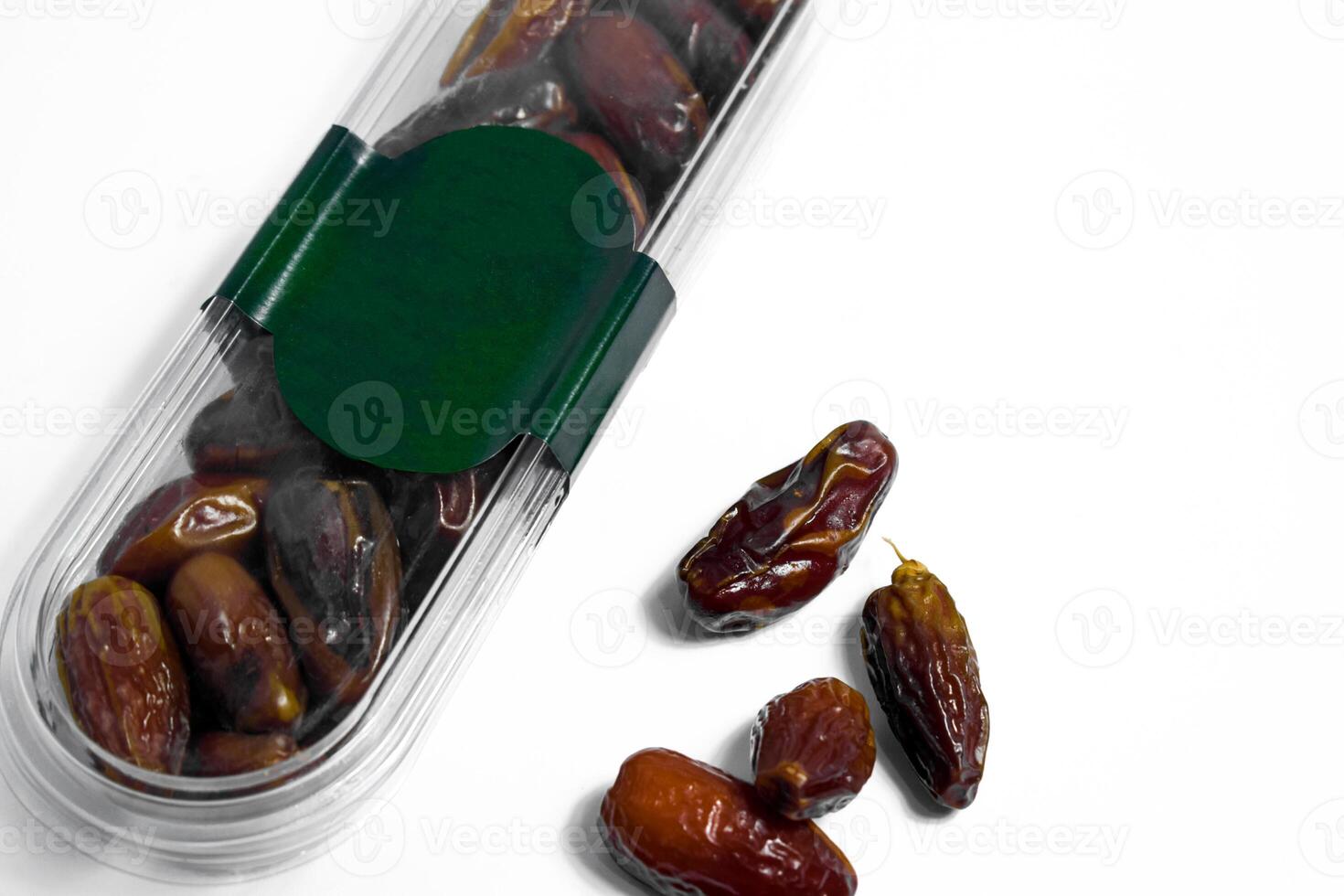 Dates fruit in plastick package with blank green label for product mockup design, dates product isolated white background photo