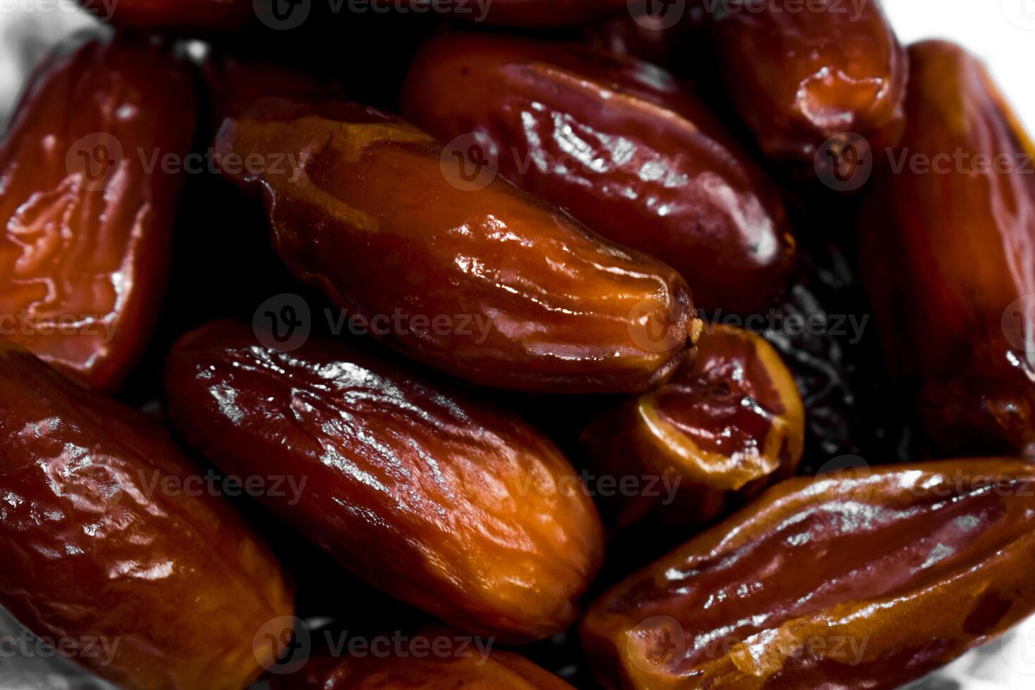 Close up fruits dates on isolated white background photo