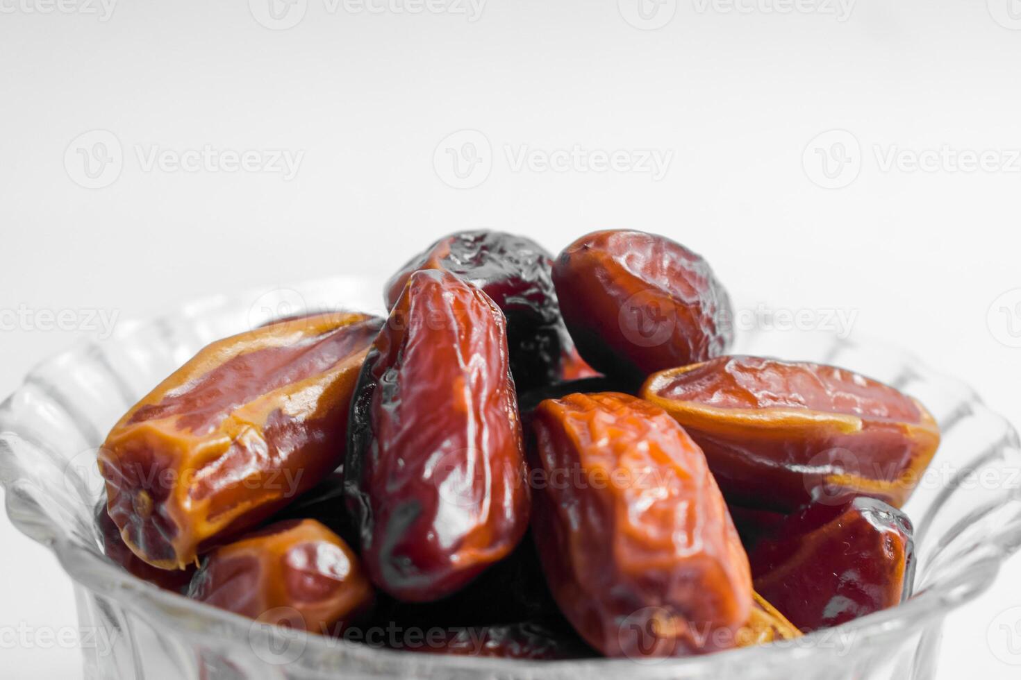 Close up fruits dates on isolated white background photo