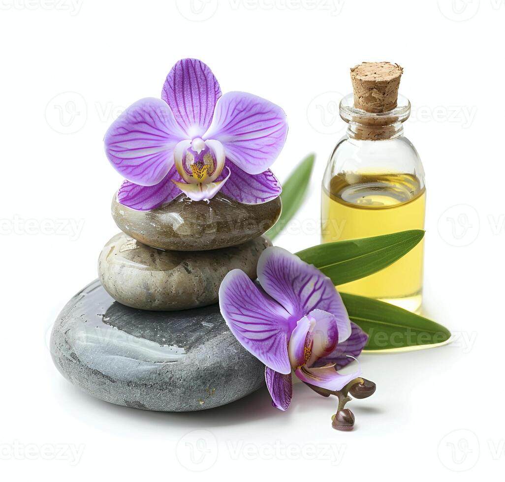 Essentiale ol and massage stone with orchids flower photo