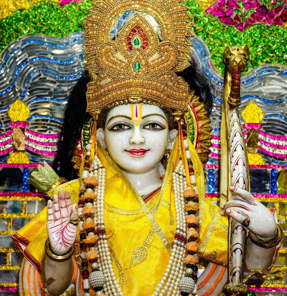 Statue of Rama close up face, hindu god, Rama - He is the seventh and one of the most popular avatars of Vishnu. photo