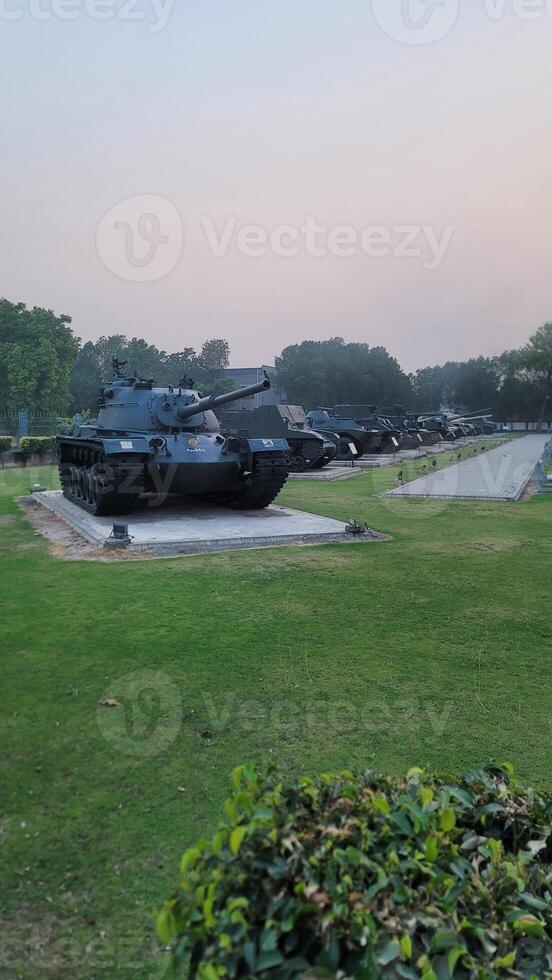Army equipment using in war are placed in public park for kids in Lahore, Pakistan on May 15, 2024. photo