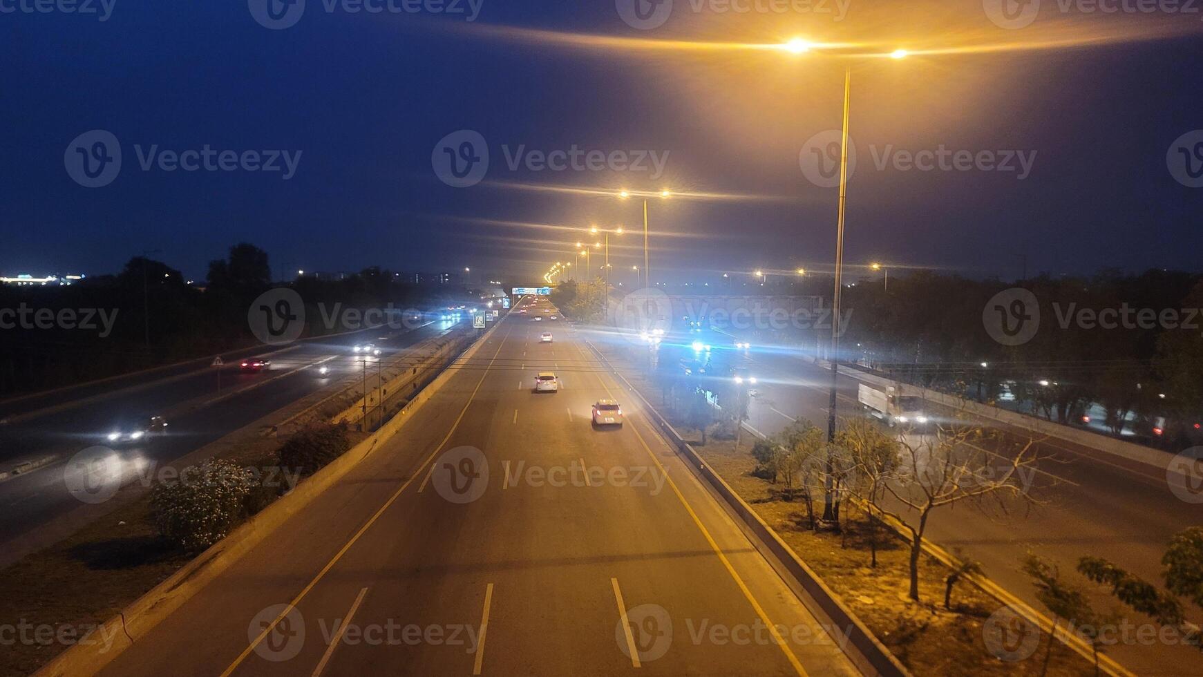 High angle night view of ring road passing around the capital city of Punjab in Lahore, Pakistan on May 15, 2024. photo