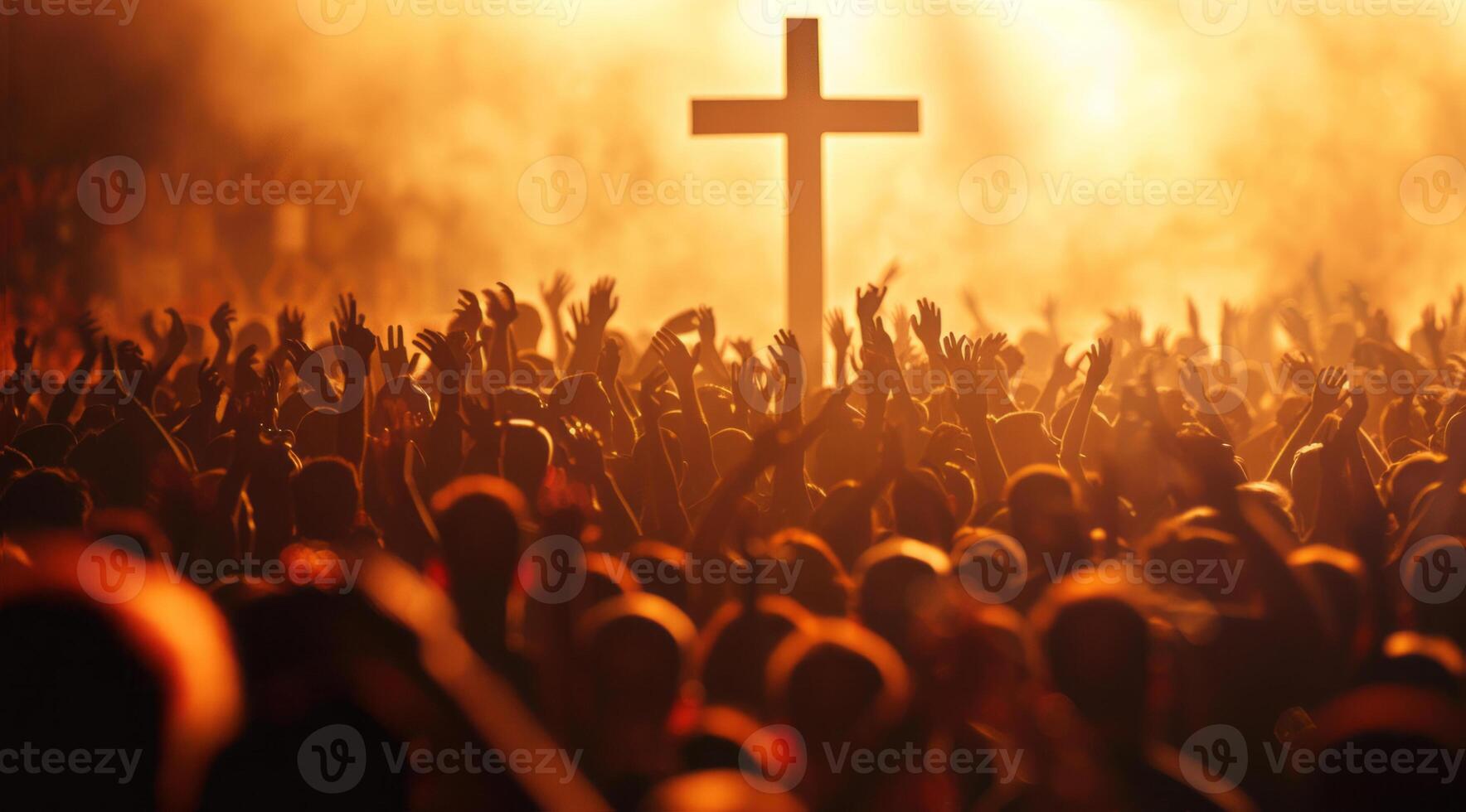 Large crowd of people praying to god and Jesus in front of the Cross photo