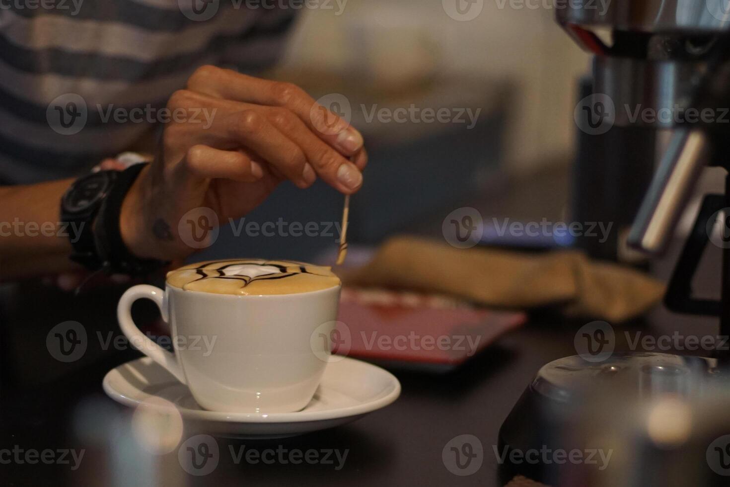 Barista Making Latte Art photo