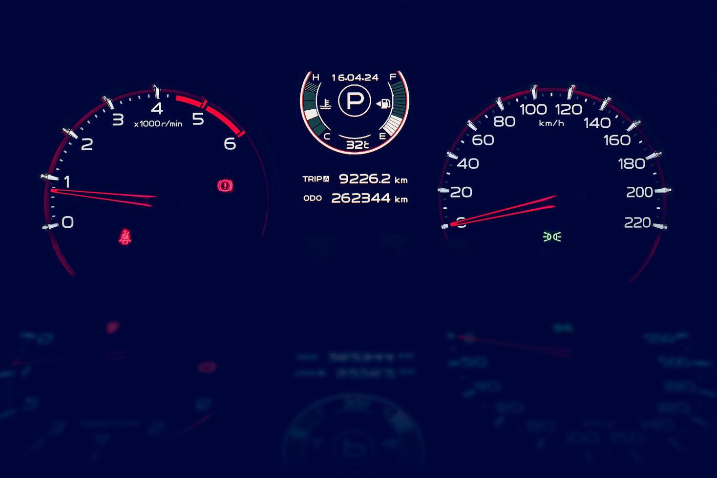 Dashboard a car's digital and analog display photo