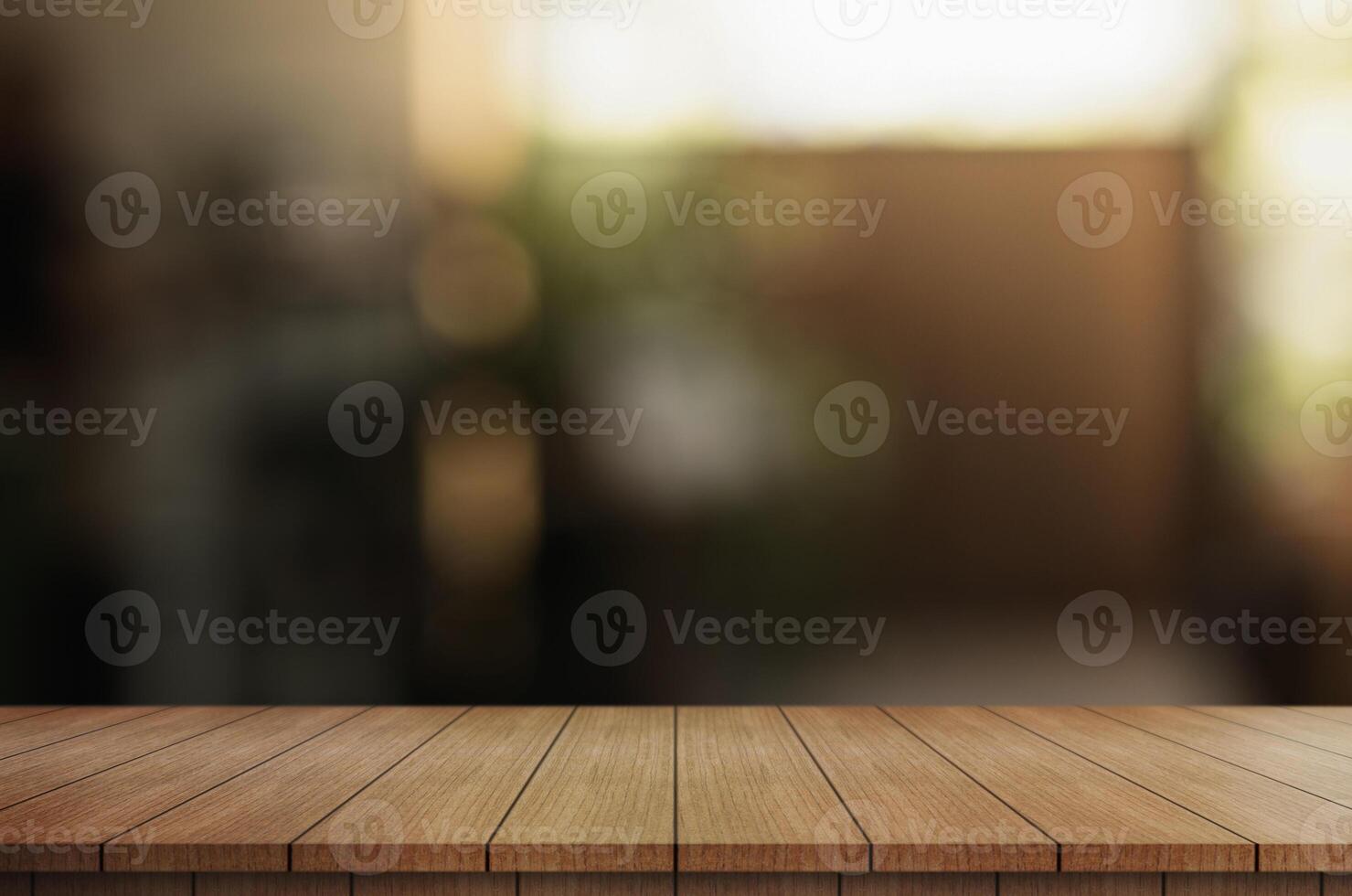 Empty wooden table top with lights bokeh on blur restaurant background. photo