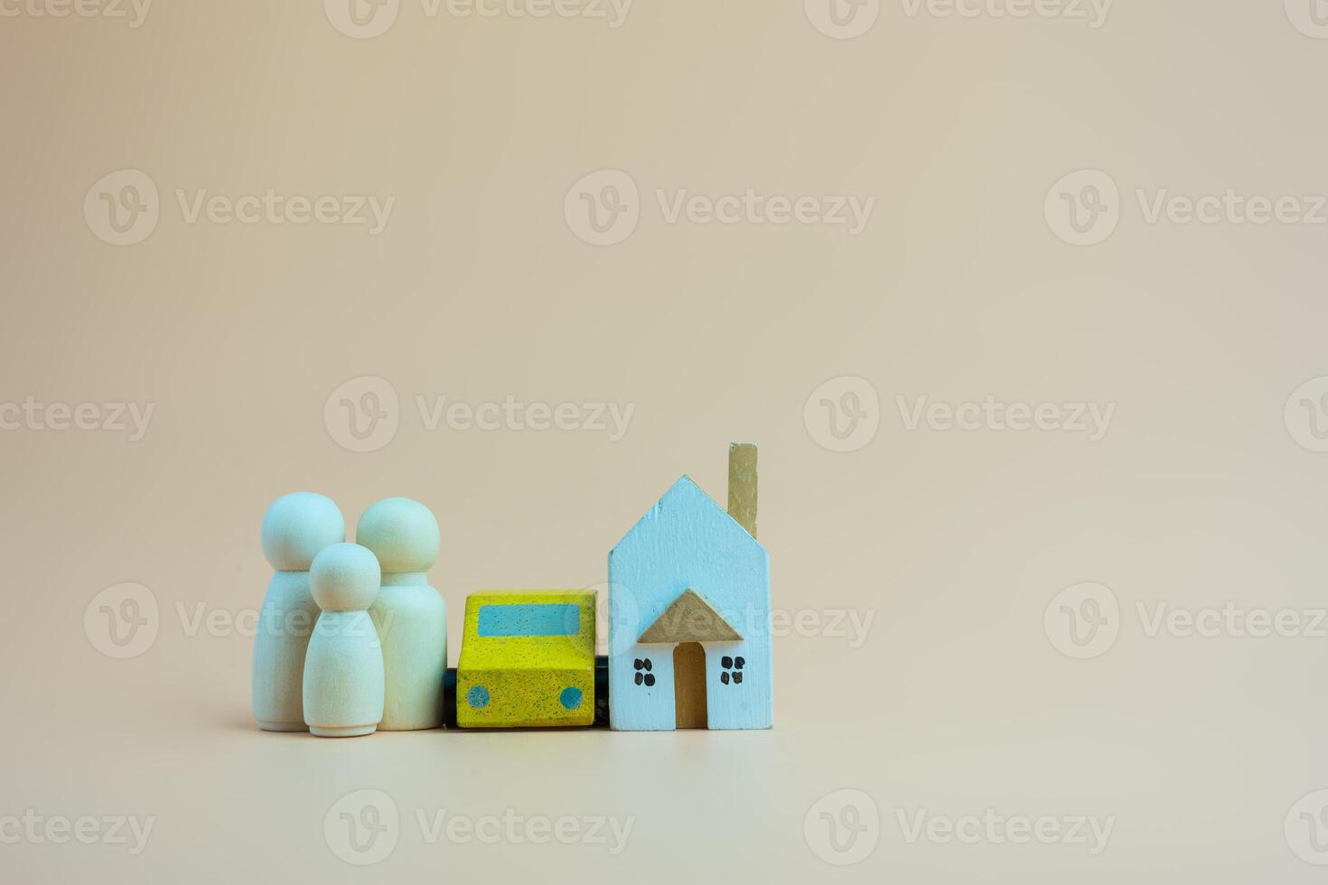 Wooden family doll human with house and car, couple relationship symbol. Insurance and property investment. photo