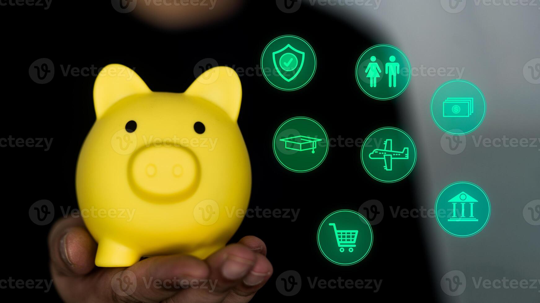 Hand holding a piggy bank and planning money icons. Concept of savings, investments or returns photo