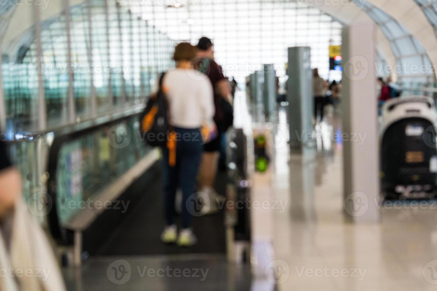Blurred picture of moving walkway airport at Suvarnabhumi Airport. photo