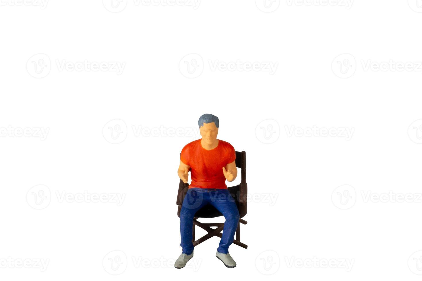 A Young man seated on a chair isolated on white background with clipping path photo