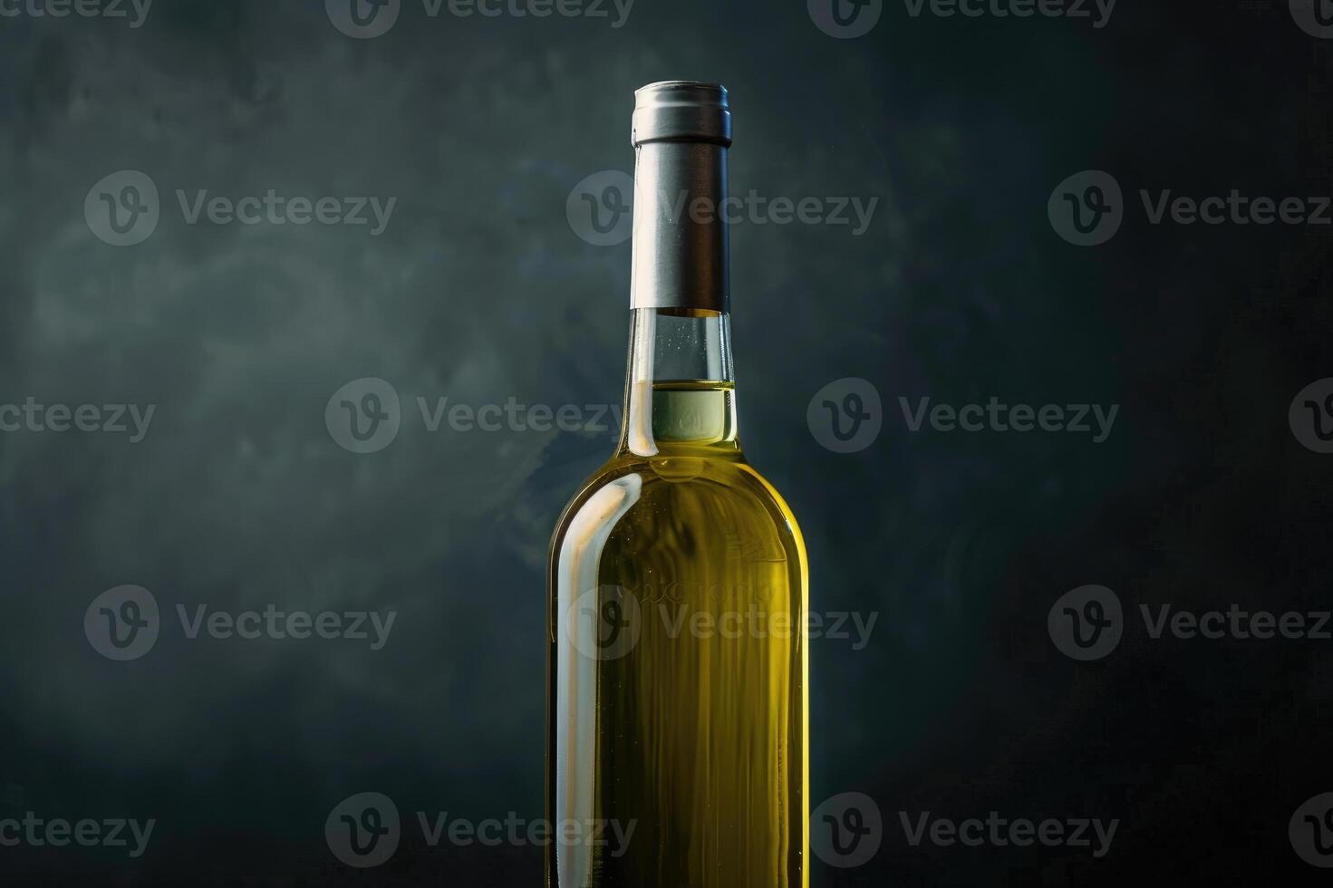 A clear bottle of white wine photo