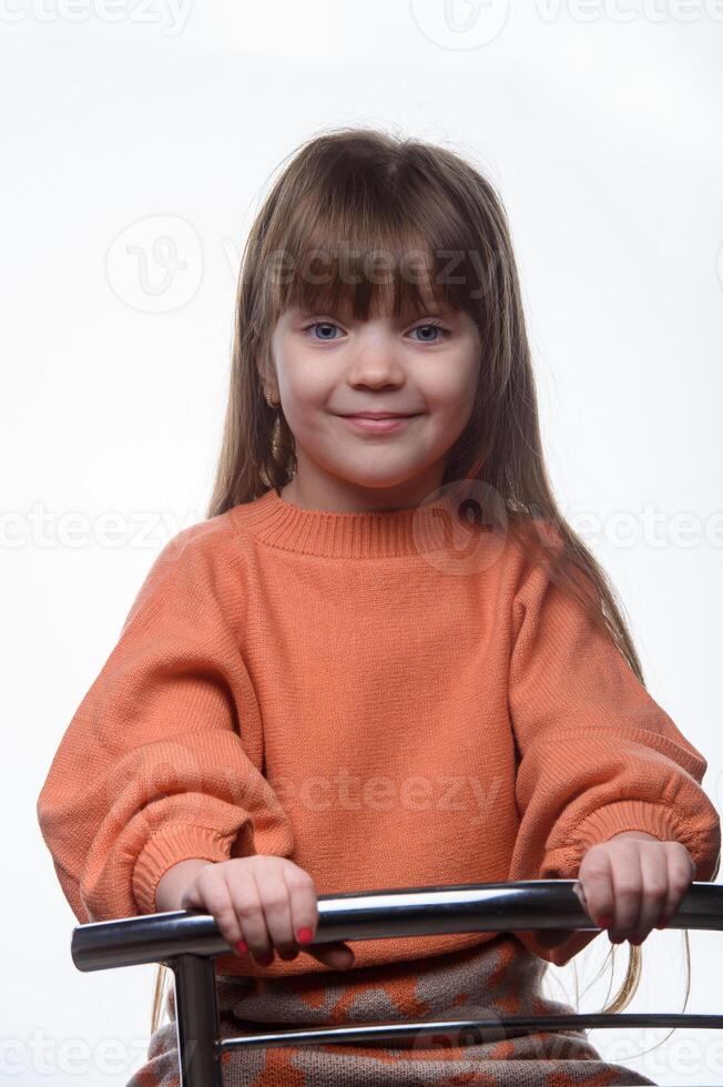 studio portrait of a charming little girl on a white background 5 photo