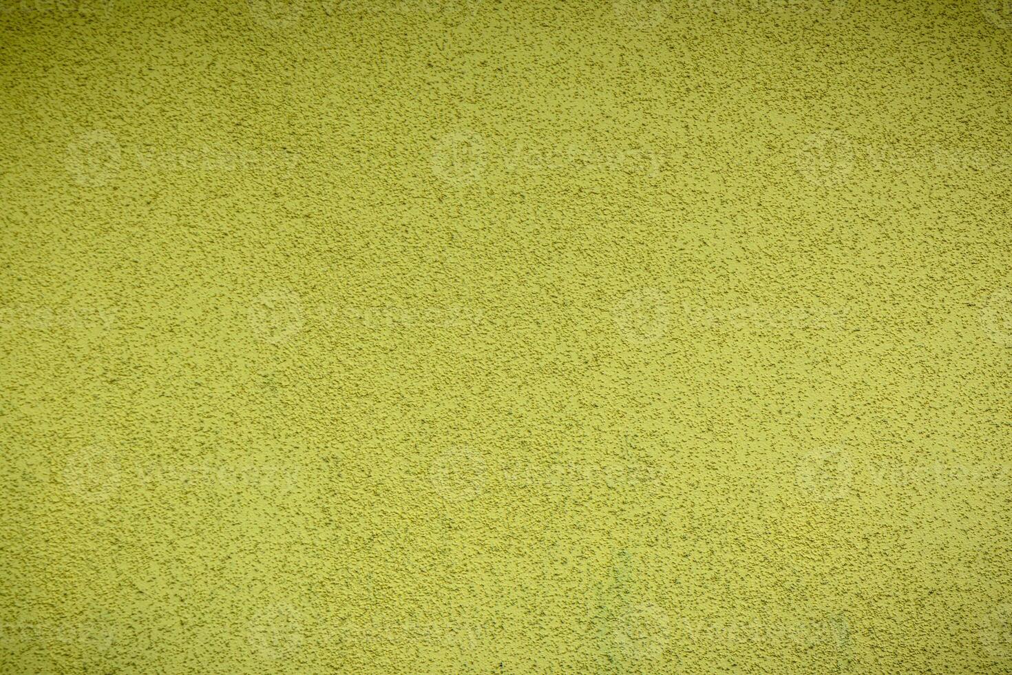 Cement wall painted yellow texture photo