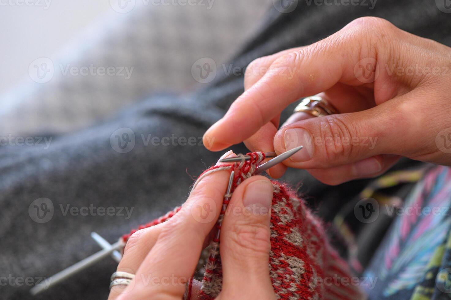 Close up of the hands of an woman knitting sock 3 photo