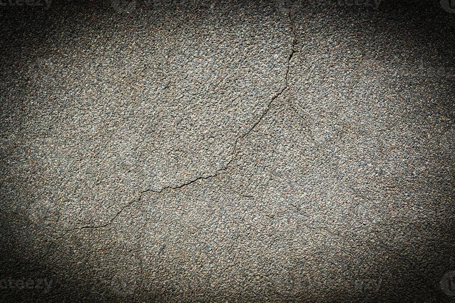 Crack in plaster wall texture for design with copy space. photo
