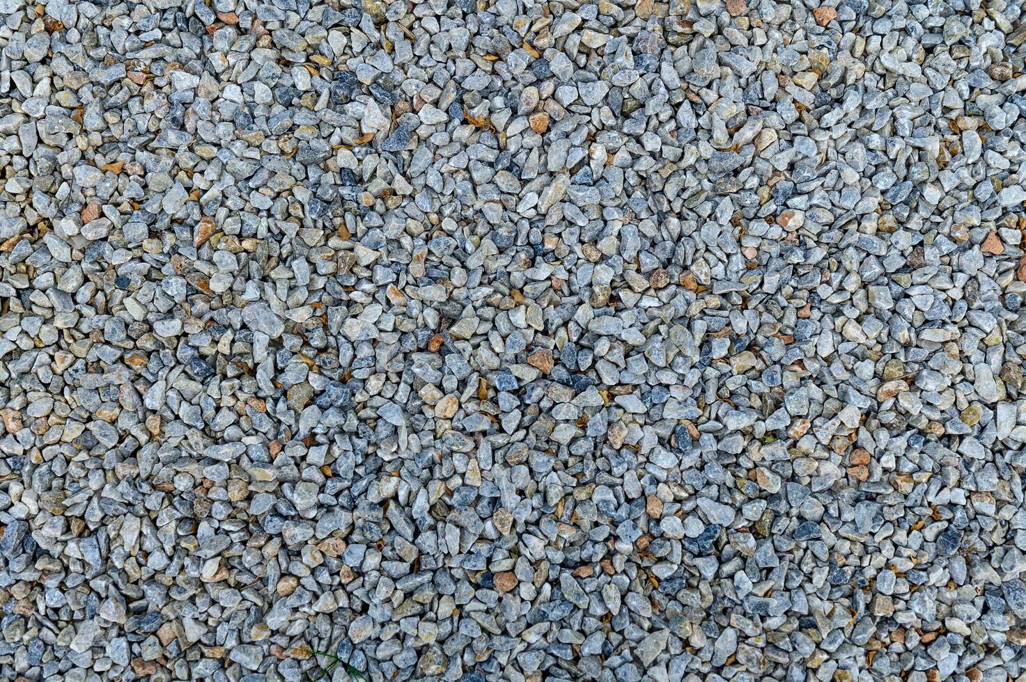 crushed stone poured on the ground as a background 2 photo