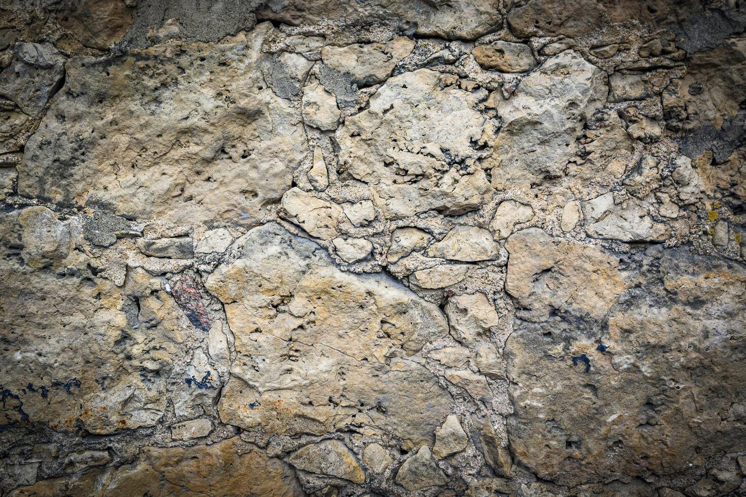 Stone wall texture background - with stones of different sizes 1 photo