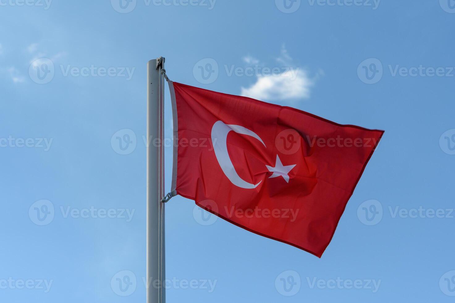 Turkey flag against blue sky 1 photo