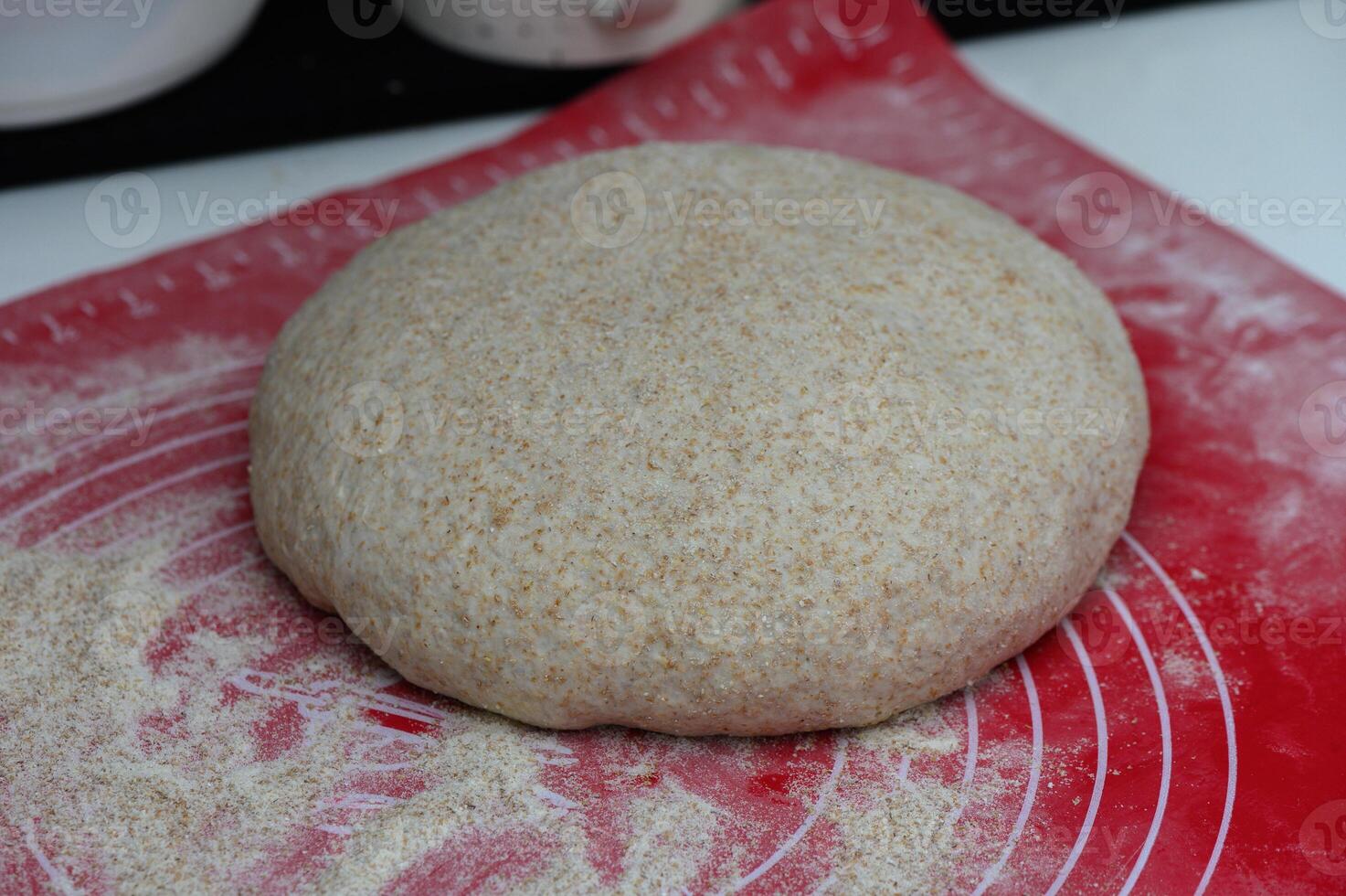 dough formed for bread in the kitchen 1 photo