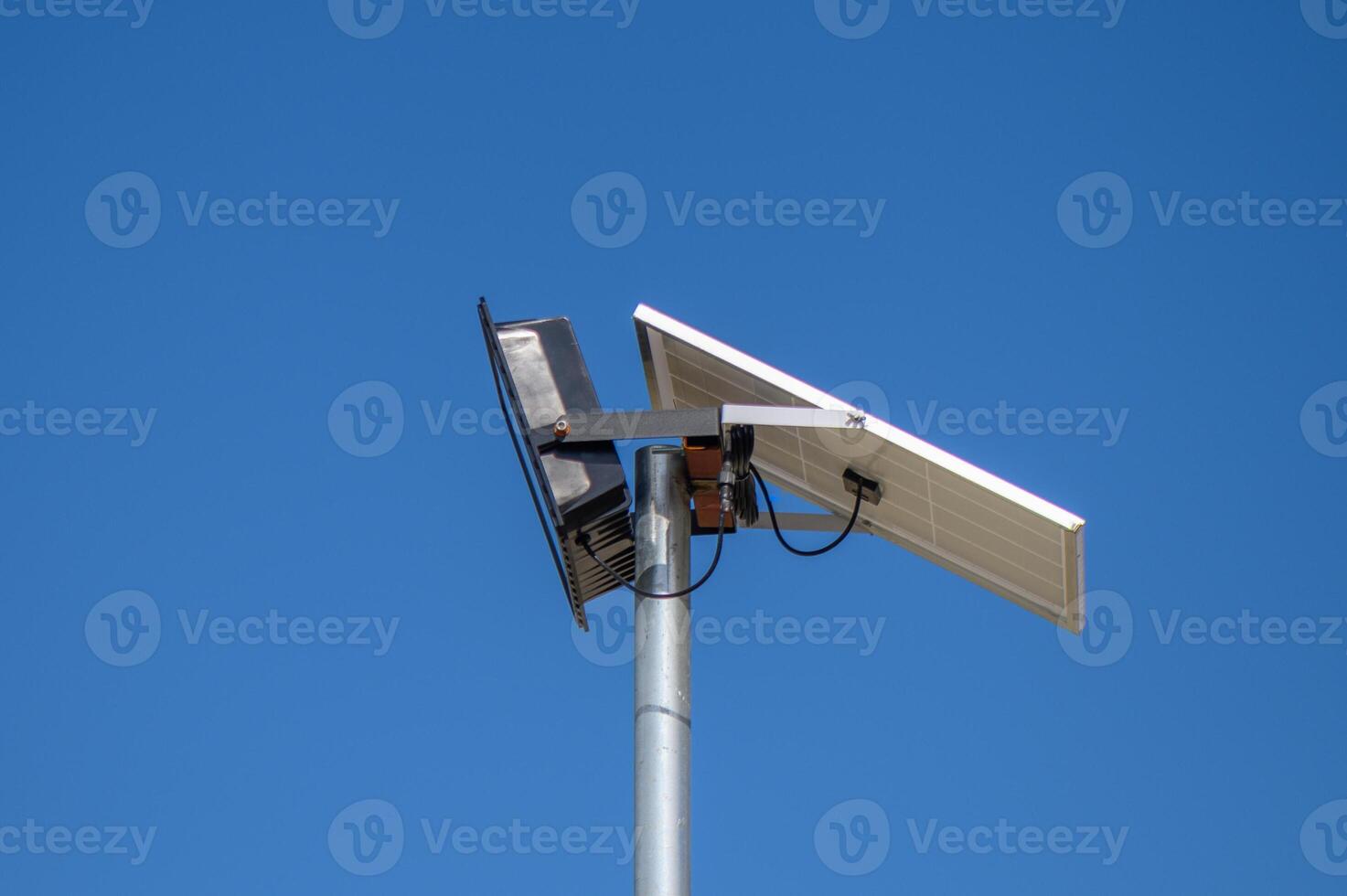 solar-powered street lighting floodlight against the sky 1 photo