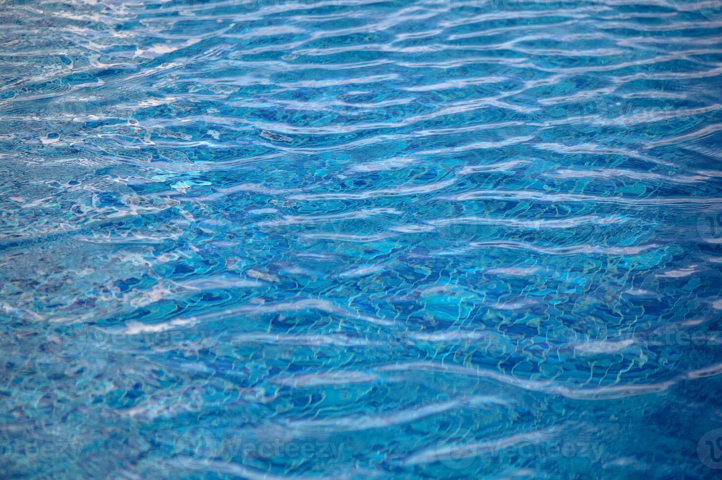 surface of blue swimming pool,background of water in swimming pool.1 photo