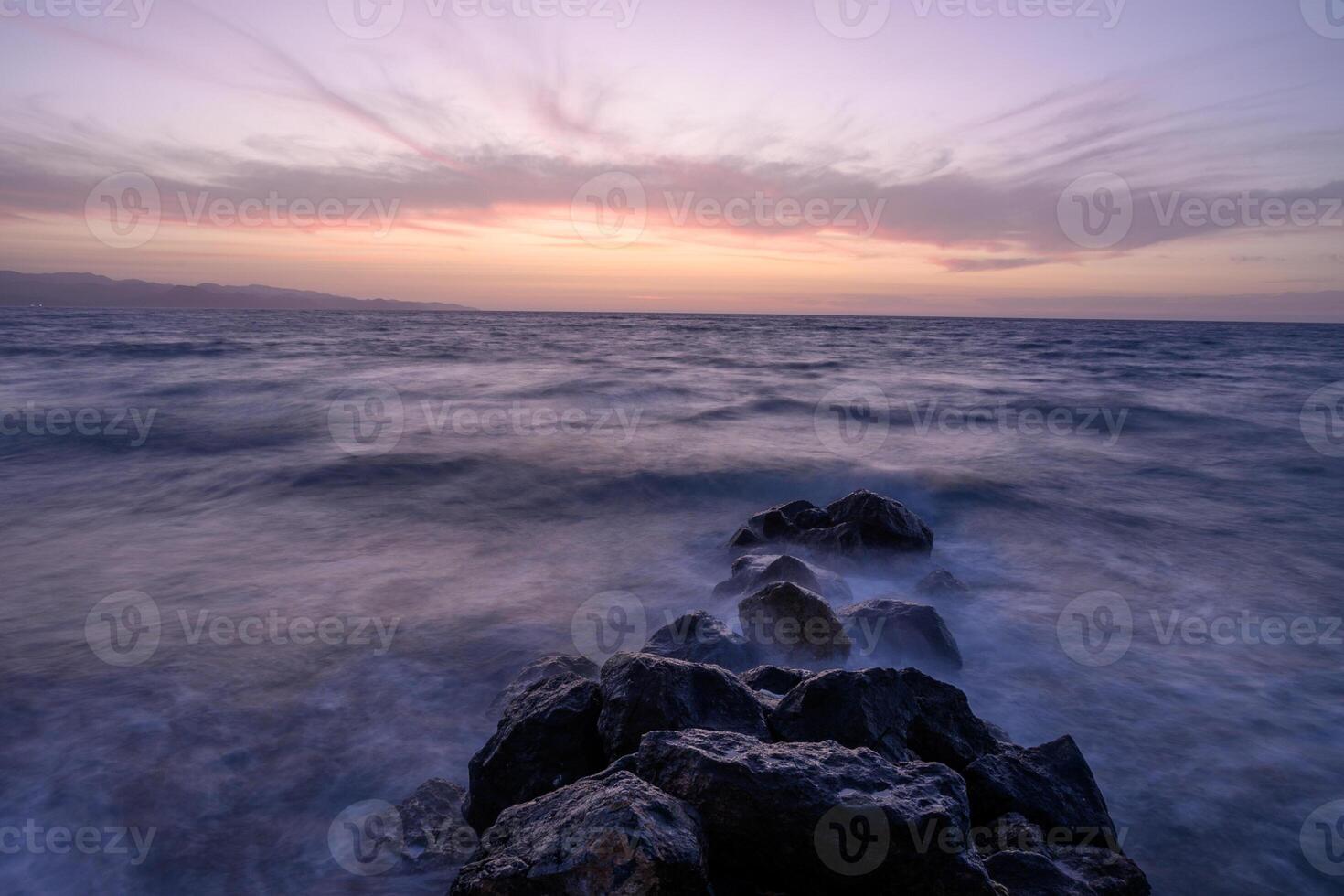 Sunset on Mediterranean Sea. Cloudy day. photo