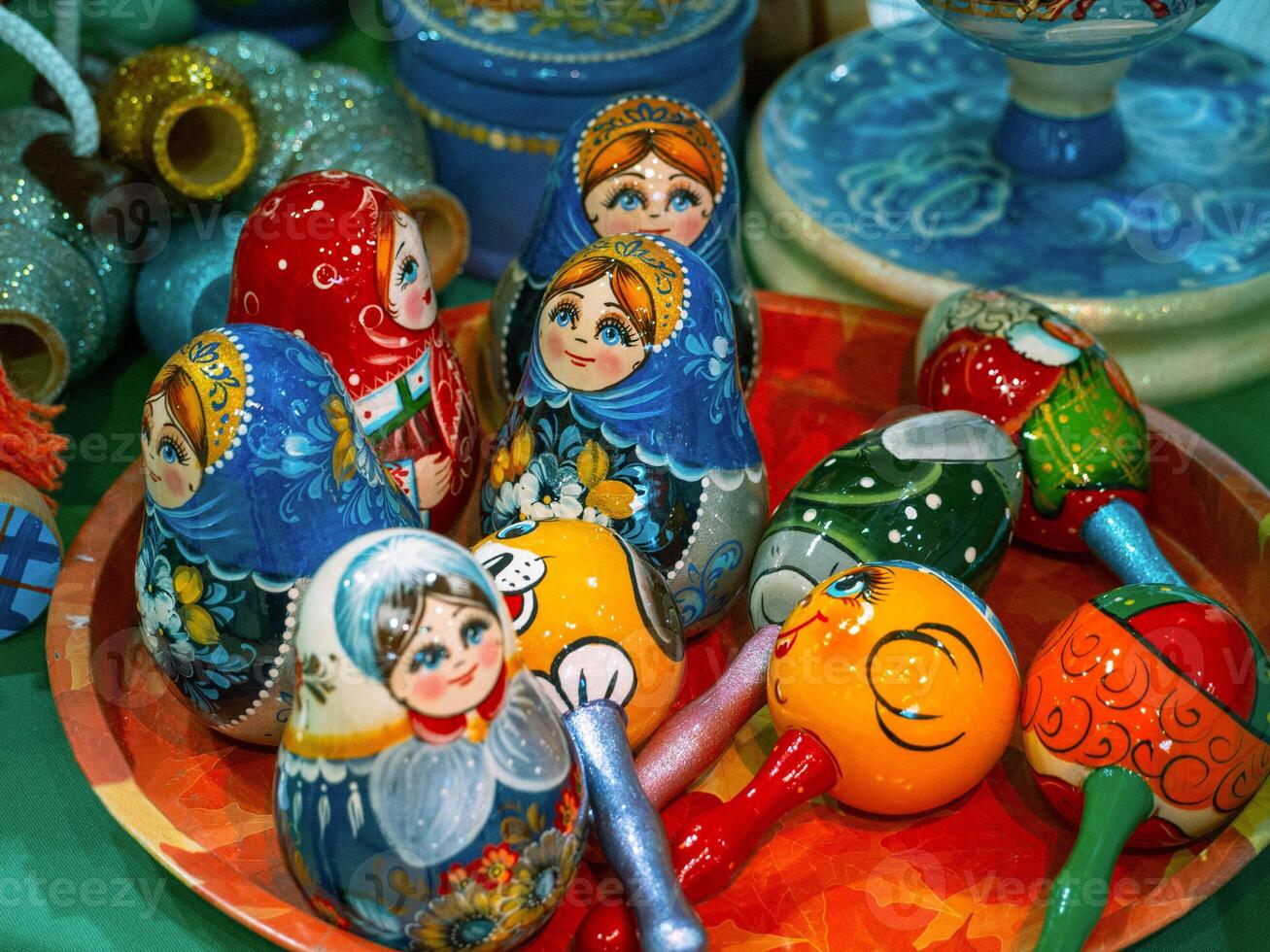 Various beautiful matryoshka dolls for sale on the shelf in a souvenir shop. photo